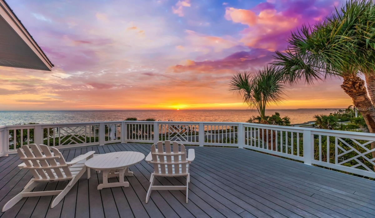 The deck off the primary suite at sunrise