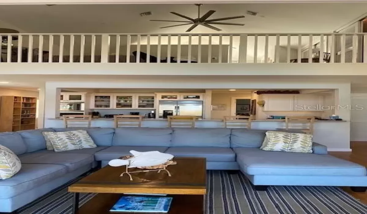 Greatroom w view up to loft/primary suite