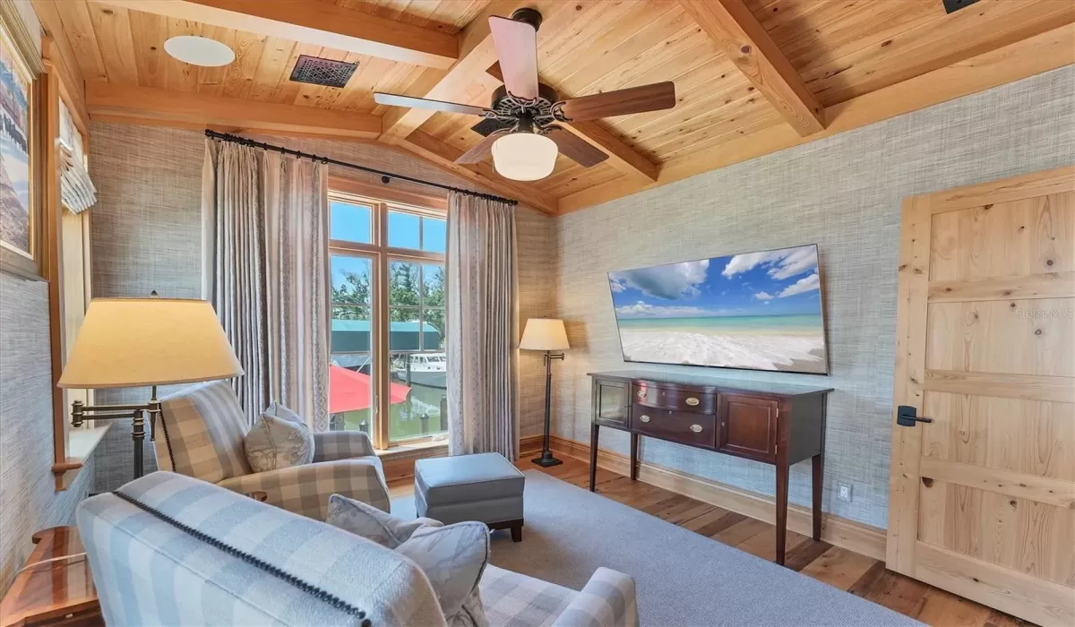 BZ's Lounge inspired den that could also be used as a guest bedroom on the main floor (features closet).