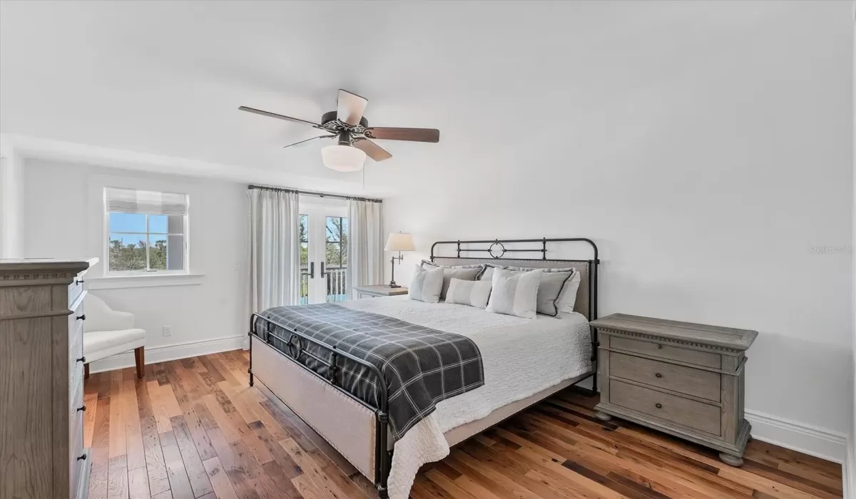 Second Floor Guest Bedroom Ensuite with private outdoor deck and walk-in closet!