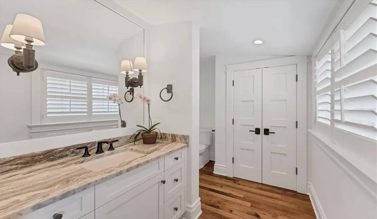 Guest Bathroom with linen closet/storage and shower