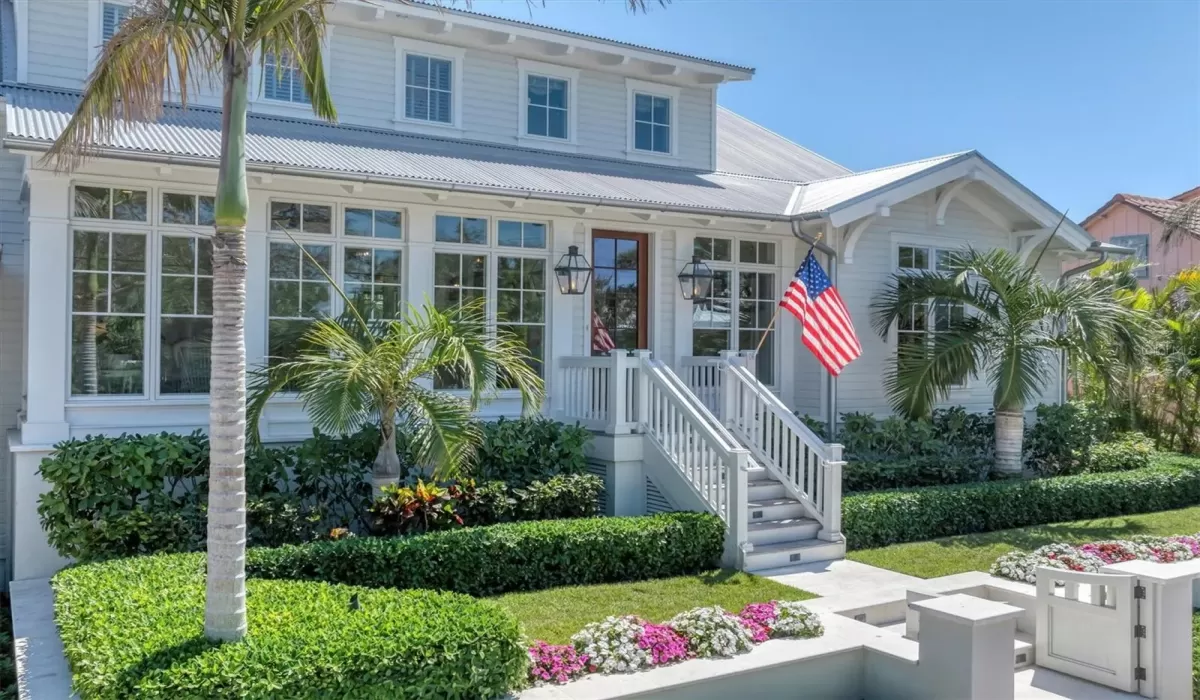 Impact rated Anderson windows and a custom designed mahogany front door