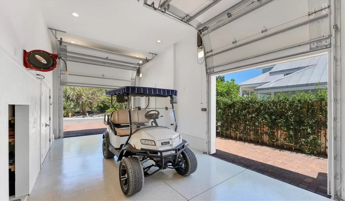 1-car extended garage with side entry access and add'l room to park your golf cart on the side of the house.